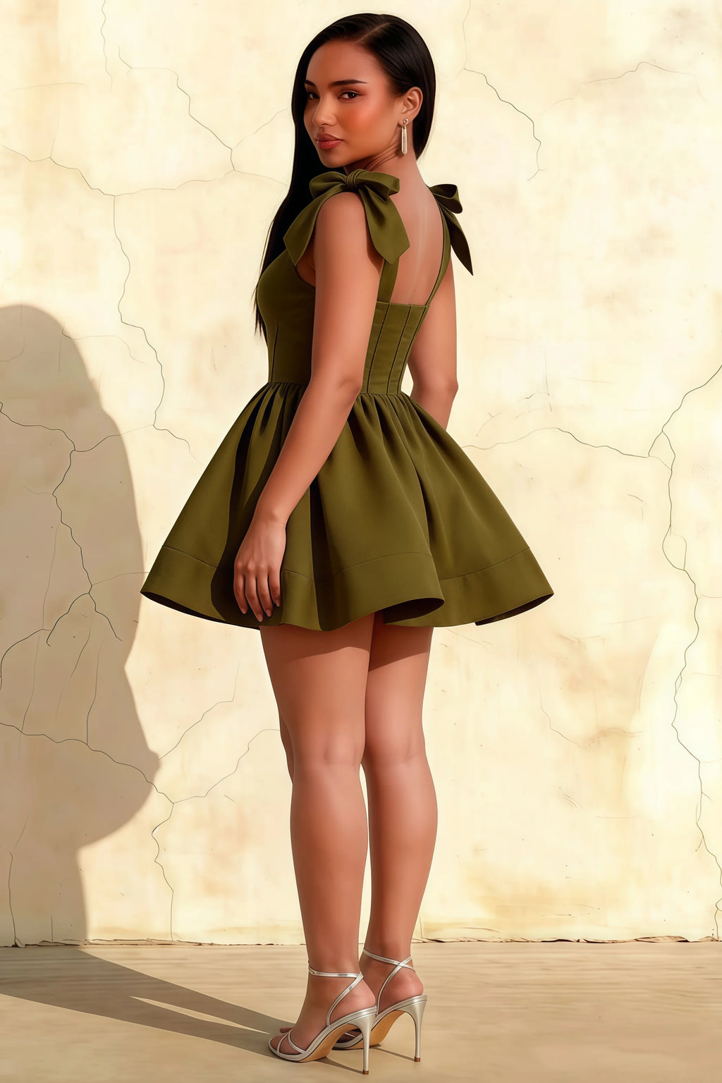 Curvy Model Wearing LVLVS Olive Green Cocktail Dress, Side View Showcasing Stretch Crepe Fabric and Tie Back Detail for Evening Party