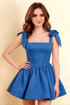 Close up fit and flare silhouette of LVLVS Royal Blue Cassandra dress with square neckline for cocktail party