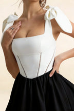 Fabric detail of LVLVS Cassandra white and black stretch crepe dress with boning and square neckline for prom