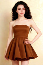 Close up of LVLVS chocolate Catherine dress featuring bandeau top and bonded crepe texture, ideal for club nights and date nights with a fitted bodice.