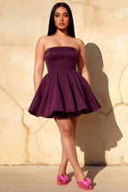 Plus size model in LVLVS Catherine grape bandeau mini dress, inclusive sizing bonded crepe Club dress