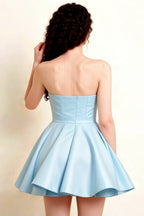 Back View of Light Blue Catherine Bandeau Ruffle Mini Dress, Detailed Look at Strapless Back Design for Homecoming and Sorority Rush Events