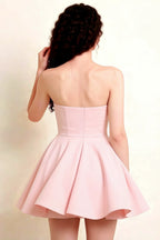 Flattering Back Design of Light Pink Ruffle Dress for Classy Social Gatherings