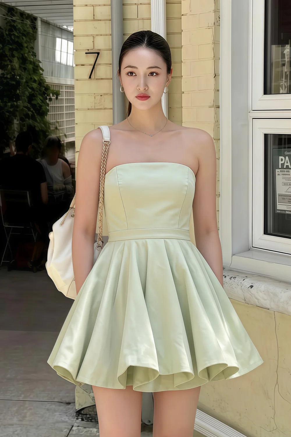 Real customer wearing LVLVS Sage Green Catherine dress for a casual summer brunch, highlighting the comfortable bonded crepe fabric and versatile mini length suitable for daily wear and going out.