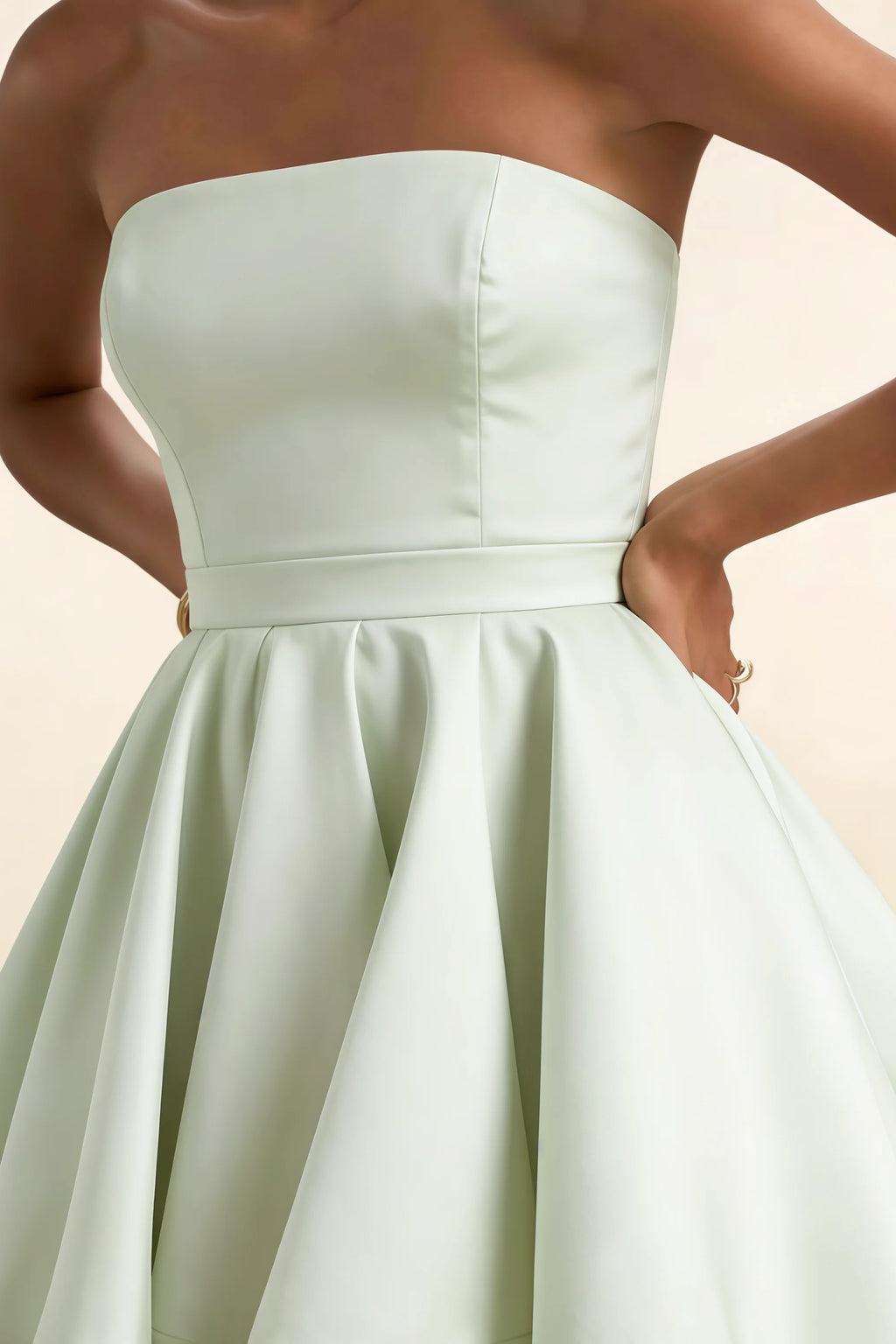 Detail view of LVLVS Sage Green Catherine dress highlighting the clean bandeau top design and high-quality bonded crepe material, versatile for both office wear and cocktail parties.