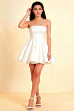 White strapless bonded crepe cocktail dress perfect for bridesmaid duties and semi-formal parties.