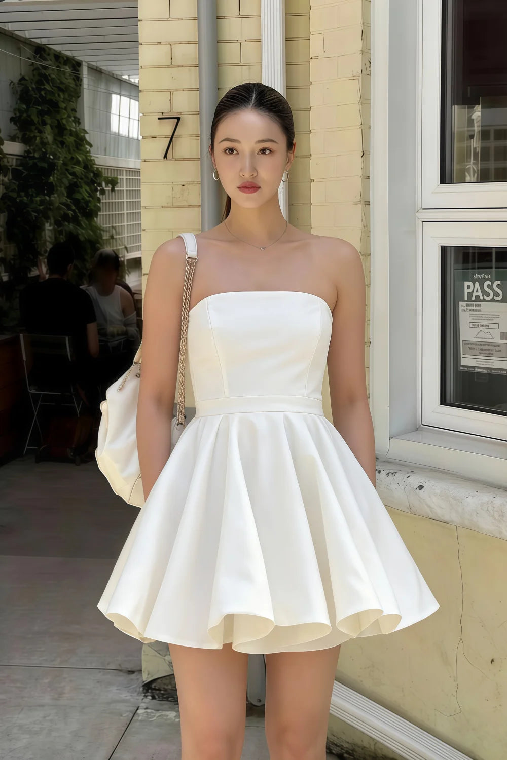 Real customer wearing LVLVS white bandeau dress for summer street style and casual brunch outfit.