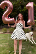 Customer photo of LVLVS Catherine White Polka Dot Dress styled for 21st birthday party, holding balloons with a dog, fun and classy celebration look.