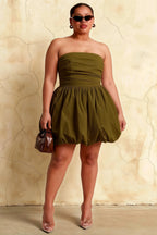 Plus Size Model in LVLVS Olive Green Cathy Puff Ball Mini Dress Suitable for Curvy Bridesmaids and Plus Size Party Guests