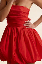 Close Up of LVLVS Cathy Red Puff Ball Strapless Mini Dress Ruched Waist Detail for Club and Dance Night