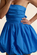 Detail focus on the bodice of LVLVS Royal Blue Cathy strapless puff dress, showing the elastic gathering and smooth stretch cotton finish, ideal for cocktail and going out wear.