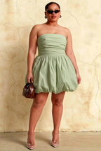 Plus size model in LVLVS Cathy sage green puff ball strapless mini dress for club party