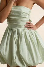 LVLVS Cathy sage green ruched waist puff ball strapless mini dress fabric detail for wedding guest