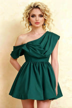 Studio shot of LVLVS Cecilia mini skater dress in rich green crepe fabric, highlighting the ruched waist detail and sophisticated one shoulder style for date nights.