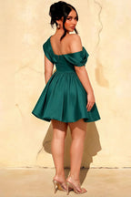 Plus size model back view in LVLVS Cecilia peacock crepe dress, showcasing the stretchy fabric and elegant silhouette perfect for sorority rush or homecoming dances.
