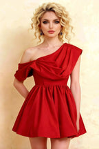 Close up studio shot of LVLVS Red Cecilia Dress, highlighting ruched asymmetric neckline and textured crepe material, a classy choice for wedding guests and special occasions.