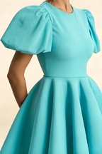 Close up LVLVS Celia aqua puff sleeves & crepe fabric | crew neck mini dress detail | party or cocktail event wear