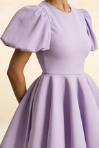 Fabric texture detail of LVLVS Celia lavender stretch crepe puff sleeve cocktail dress