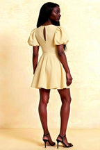 Back View of LVLVS Celia Lemon Dress with Keyhole Cutout, Elegant Puff Sleeves and Stretch Crepe Fabric Perfect for Semi-Formal Parties and Cocktail Events
