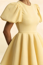 Close Up Detail of LVLVS Celia Lemon Puff Sleeve Mini Dress, Textured Stretch Crepe Fabric and Gathered Sleeve Design for Cocktail Parties and Birthdays