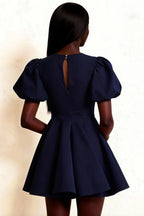 Model Back Shot LVLVS Celia Navy Dress V Back Detail Puff Sleeves Classy Semi Formal Dress for Graduation Wedding Guest
