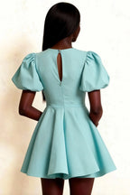 Detailed Back View of Celia Dress, Keyhole Back Puff Sleeve Design, Powder Blue Stretch Crepe Mini Dress for Formal Gatherings, Sophisticated Look for Semiformal Events