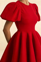 Fabric texture close up of LVLVS Celia red puff sleeve dress, smooth stretch crepe material with detailed shoulder gathering, high quality casual and formal wear for women