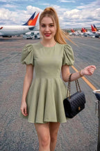 Customer Wearing LVLVS Celia Sage Green Puff Sleeve Mini Dress Airport Casual Travel Outfit with Handbag
