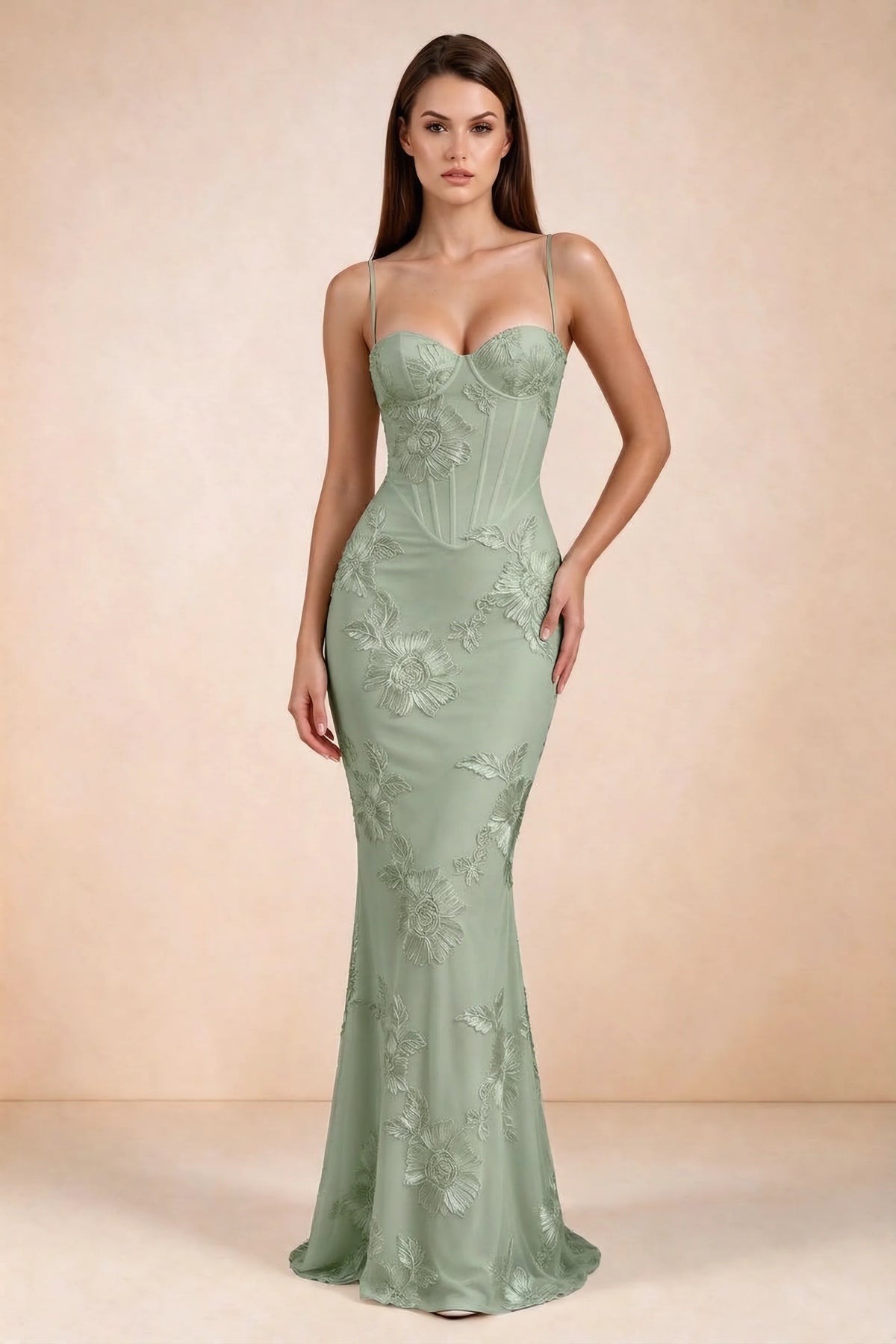 Front studio view of Celine sage green floral embroidered corset mermaid maxi dress with a long flared hem