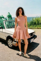 Customer Wearing Cheryl Dusty Rose Crepe Dress | Round Neck Sleeveless Skater Mini Dress Casual Chic Outdoor Styling