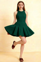 Emerald green Cheryl skater dress in stretch crepe, featuring a flattering round neck and sleeveless cut, perfect for homecoming or cocktail parties.
