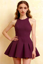Plus size model in the Grape Cheryl dress posing with hand on hip, highlighting the flattering A-line silhouette and round neck design for formal events.