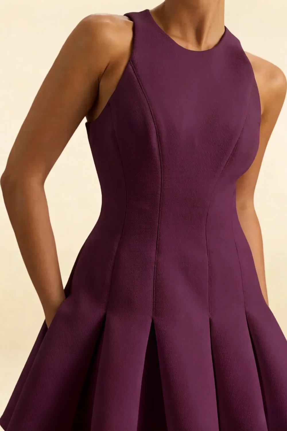 Close-up detail of the Grape Cheryl dress bodice, showcasing the round neckline, princess seams, and high-quality crepe fabric texture.