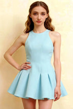 Close-up studio shot of the Light Blue Cheryl dress highlighting the structured bodice and princess seams for a tailored fit.