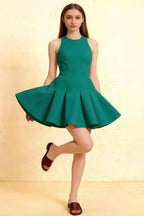 Model in Cheryl Peacock Crepe Dress – Front View, Flared Skirt, Sleeveless Round Neck, Homecoming & Semi-Formal Occasion