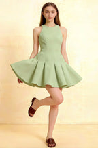 Cheryl Dress Sage Green Crepe Sleeveless Round Neck Skater Mini Dress Homecoming Semi-Formal Prom Bridesmaid Party Front View Model Wearing Chic Elegant Short Formal Dress