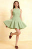 Cheryl Dress Sage Green Crepe Sleeveless Round Neck Skater Mini Dress Homecoming Semi-Formal Prom Bridesmaid Party Front View Model Wearing Chic Elegant Short Formal Dress
