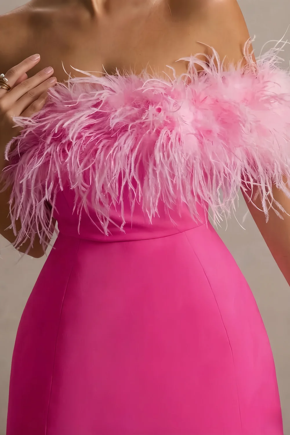 Close-Up of Chloe Hot Pink Strapless Feather Trim Mini Dress – Crepe Off-Shoulder Feather Neckline Detail, Luxurious Feather Texture for Prom/Bridesmaid Dresses