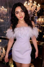 Customer wearing Chloe lavender strapless crepe dress with feather trim to fancy party event