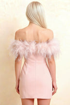 Detailed back view of Chloe light pink strapless dress, showing feather texture and zipper closure, suitable for formal dinners.