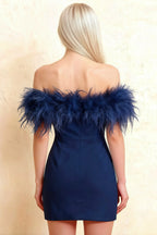 Detailed back view showing tailored seams of the Chloe navy strapless dress with feather accents, a must-have for prom season.