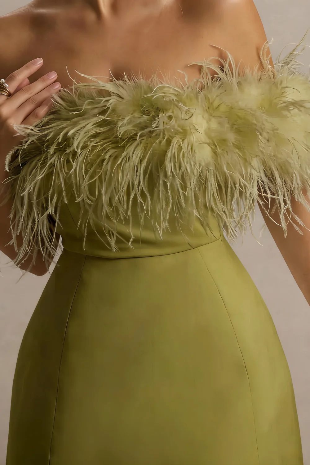 Chloe olive strapless feather trim detail, crepe mini dress, luxurious feather craftsmanship, close - up