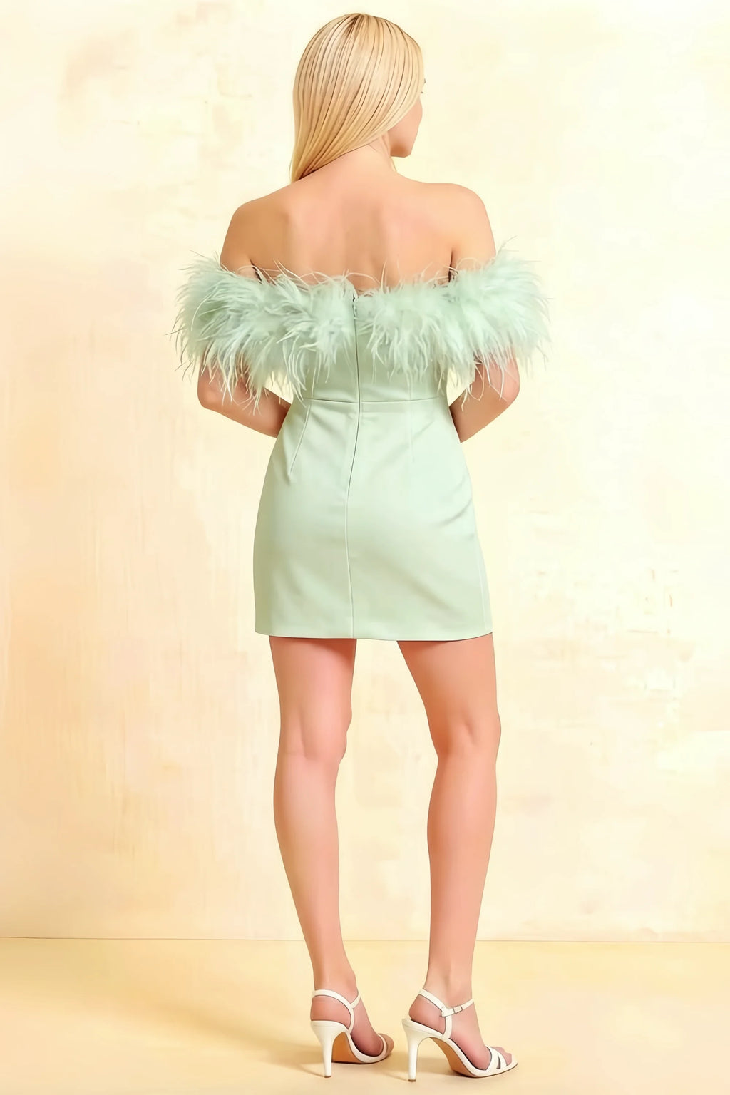 Back view of Chloe sage green crepe mini dress with off-shoulder feather detail for prom and cocktail parties