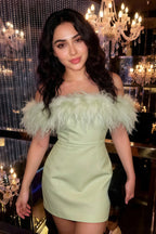Real customer wearing Chloe sage green strapless feather mini dress to party event, authentic review photo