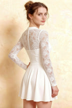 Detailed back view showcasing lace design of Christina white square neck long sleeve mini dress.