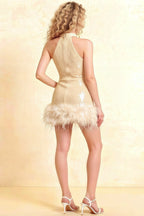Back view of Christine champagne sequin feather trim mini dress, showcasing open back design for prom or formal parties.