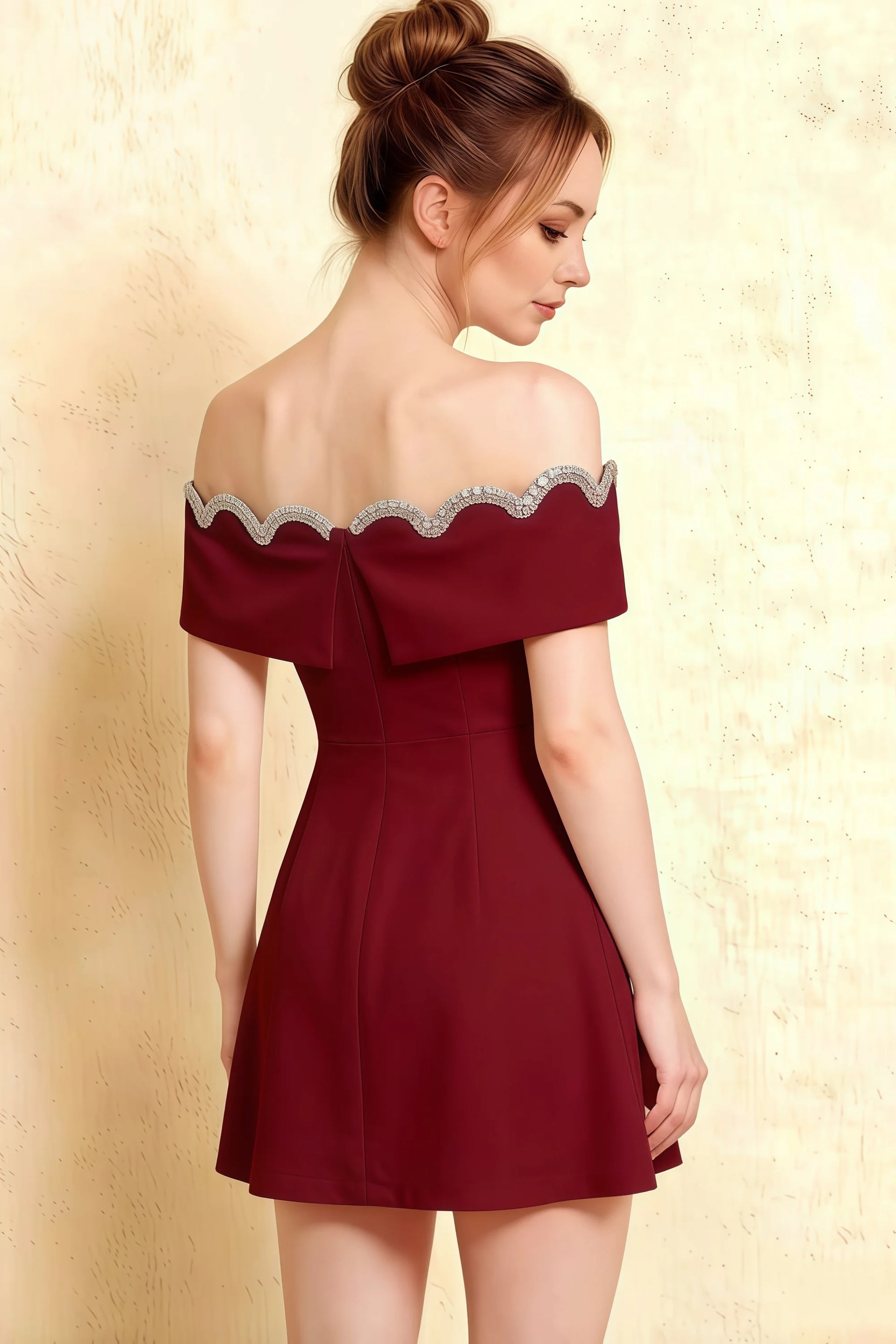 Detailed back view of Christy Burgundy dress highlighting the bow tie closure and elegant off-shoulder sleeve design.