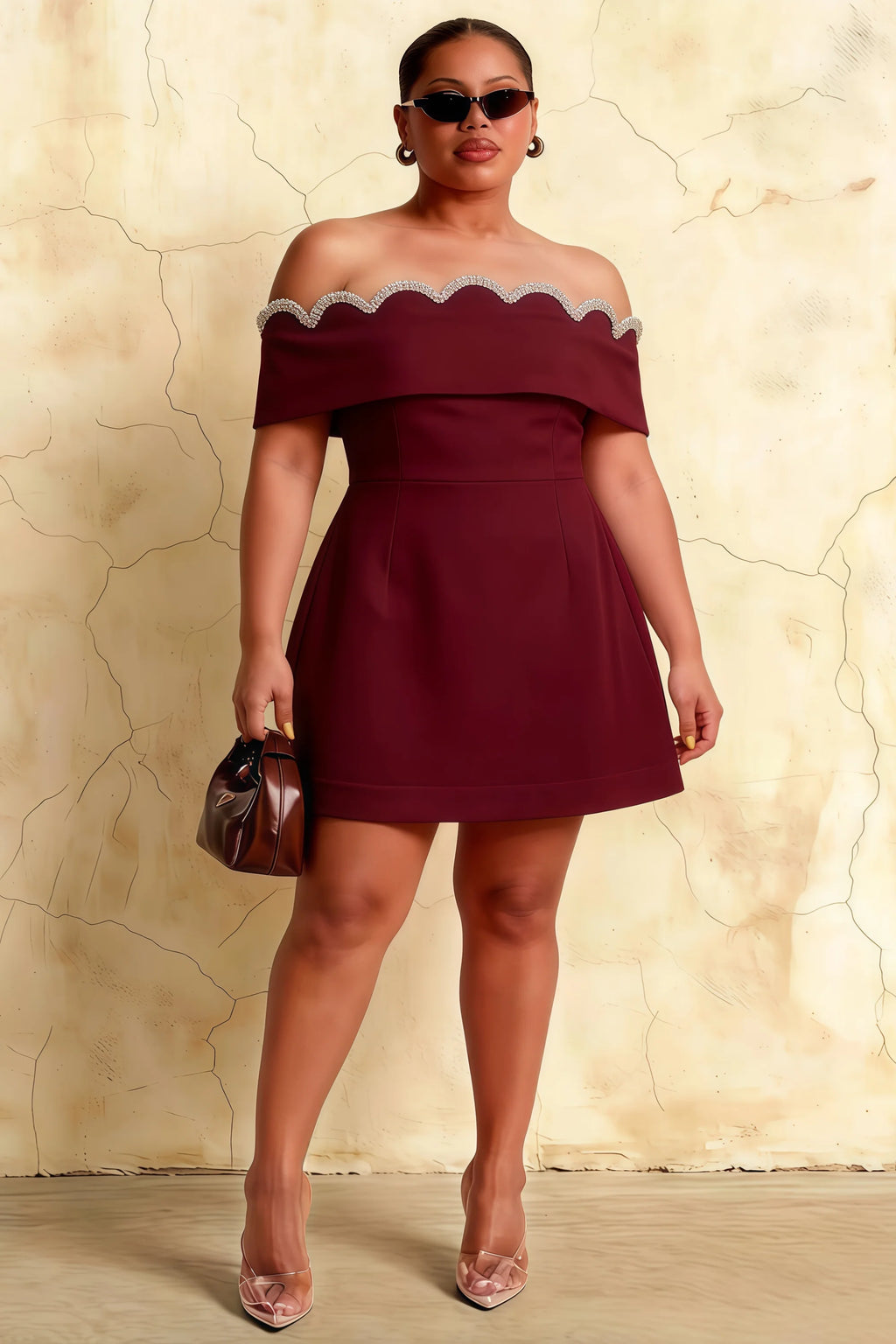 Plus size model wearing Christy Burgundy Crepe Dress - Flattering fit for curvy figures at formal dinners or proms.