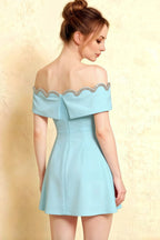 Side profile of the Christy light blue off the shoulder rhinestones mini dress demonstrating the flattering A-line silhouette.