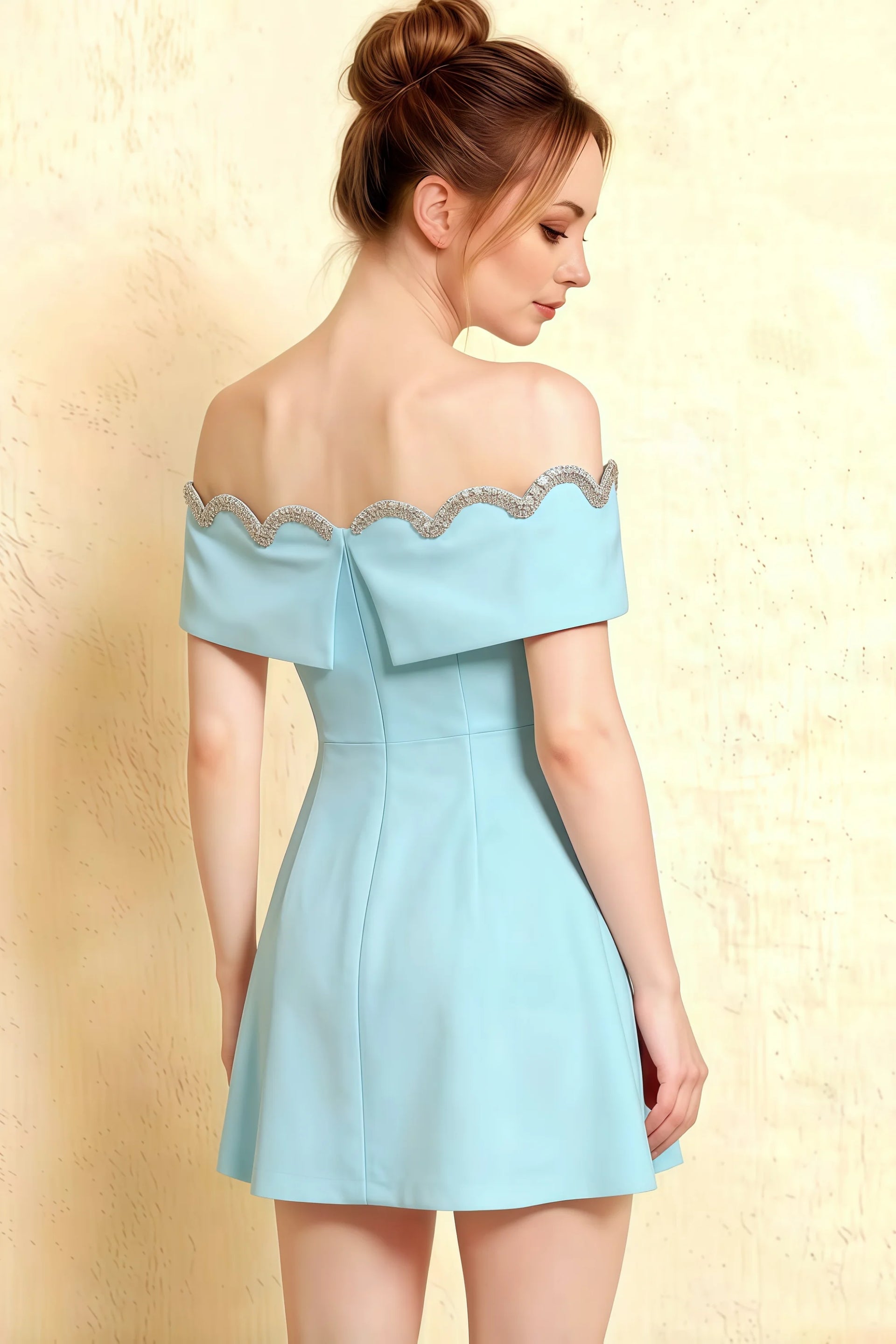 Side profile of the Christy light blue off the shoulder rhinestones mini dress demonstrating the flattering A-line silhouette.